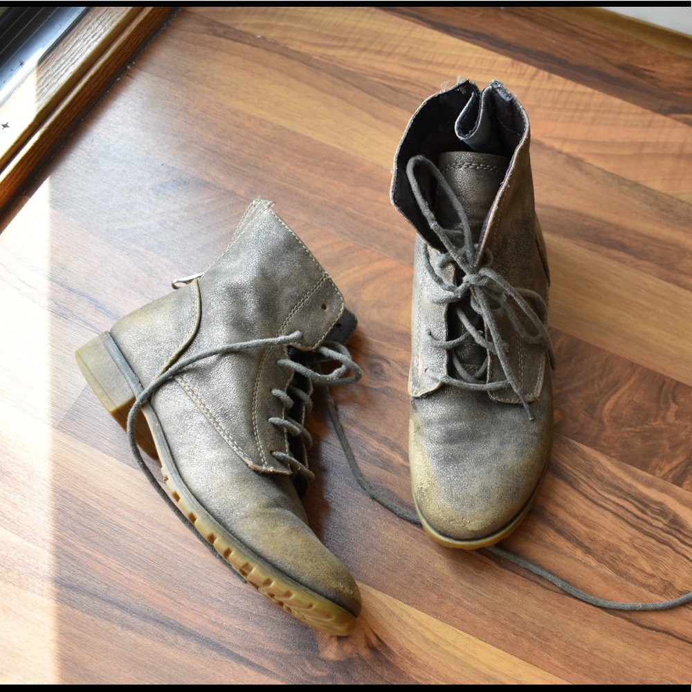 Distressed combat boots